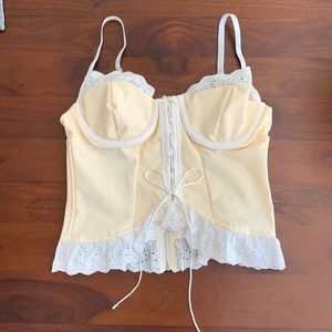 NWOT Sky to Moon corset top with eyelet lace trim. Size small. Cream and white.